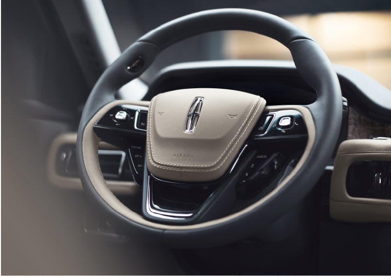 The intuitively placed controls of the steering wheel on a 2023 Lincoln Aviator® SUV | Parks Lincoln of Gainesville in Gainesville FL