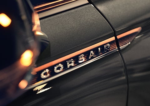 The stylish chrome badge reading “CORSAIR” is shown on the exterior of the vehicle. | Parks Lincoln of Gainesville in Gainesville FL