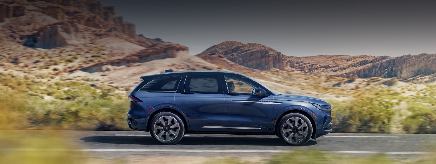 A 2024 Lincoln Nautilus® SUV is being driven in a desert setting. | Parks Lincoln of Gainesville in Gainesville FL