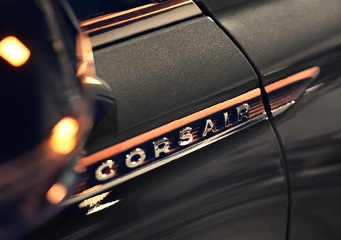 The stylish chrome badge reading “CORSAIR” is shown on the exterior of the vehicle. | Parks Lincoln of Gainesville in Gainesville FL