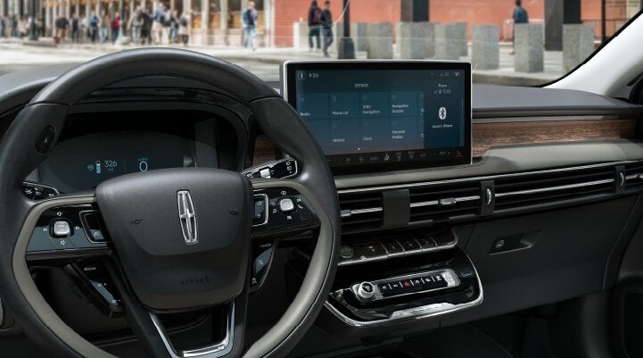 The center screen of the new 2025 Lincoln Corsair® SUV is showcased with its SYNC® 4 capabilities highlighted | Parks Lincoln of Gainesville in Gainesville FL
