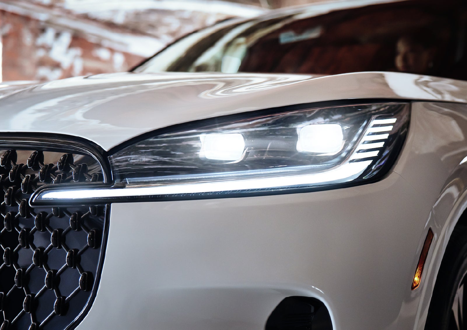 A close-up of a headlamp on the 2027 Lincoln Aviator® SUV is shown. | Parks Lincoln of Gainesville in Gainesville FL